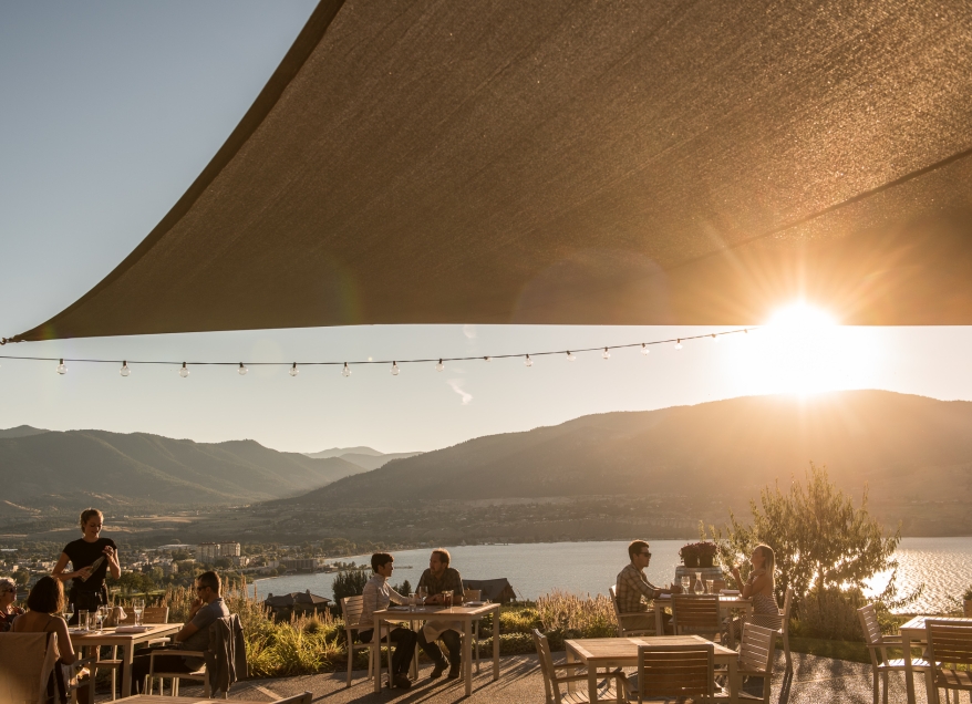 Dining at The Vanilla Pod Restaurant at Poplar Grove Winery with views of Okanagan Lake and Penticton.